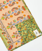 Kantha quilt throw featuring traditional kantha hand stitching