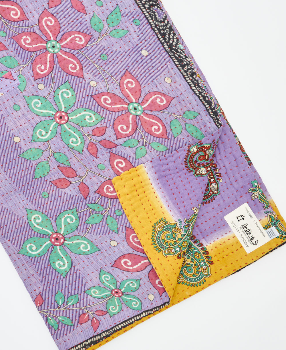 Kantha quilt throw featuring traditional kantha hand stitching
