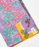 Kantha quilt throw featuring traditional kantha hand stitching