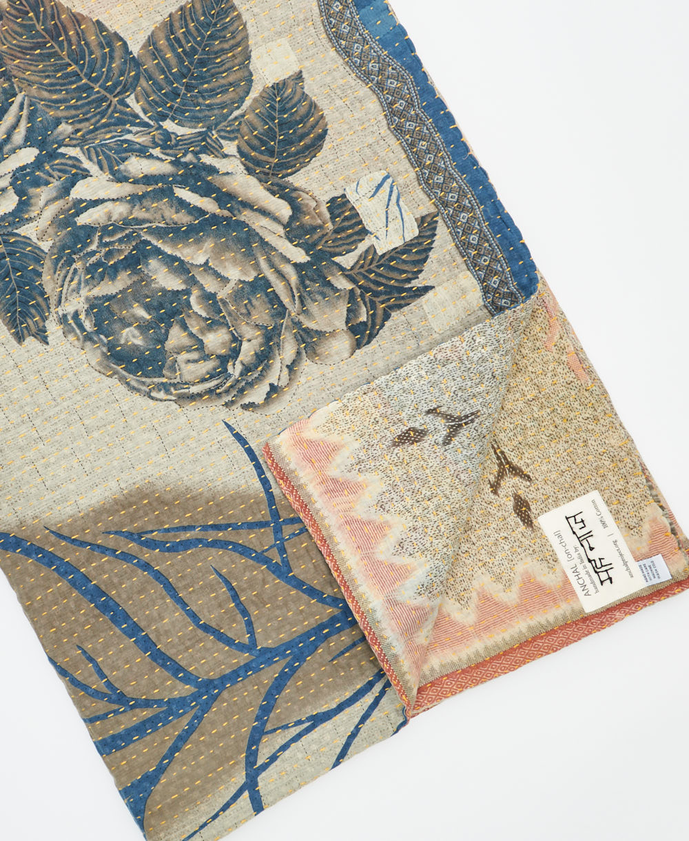 Kantha quilt throw featuring traditional kantha hand stitching