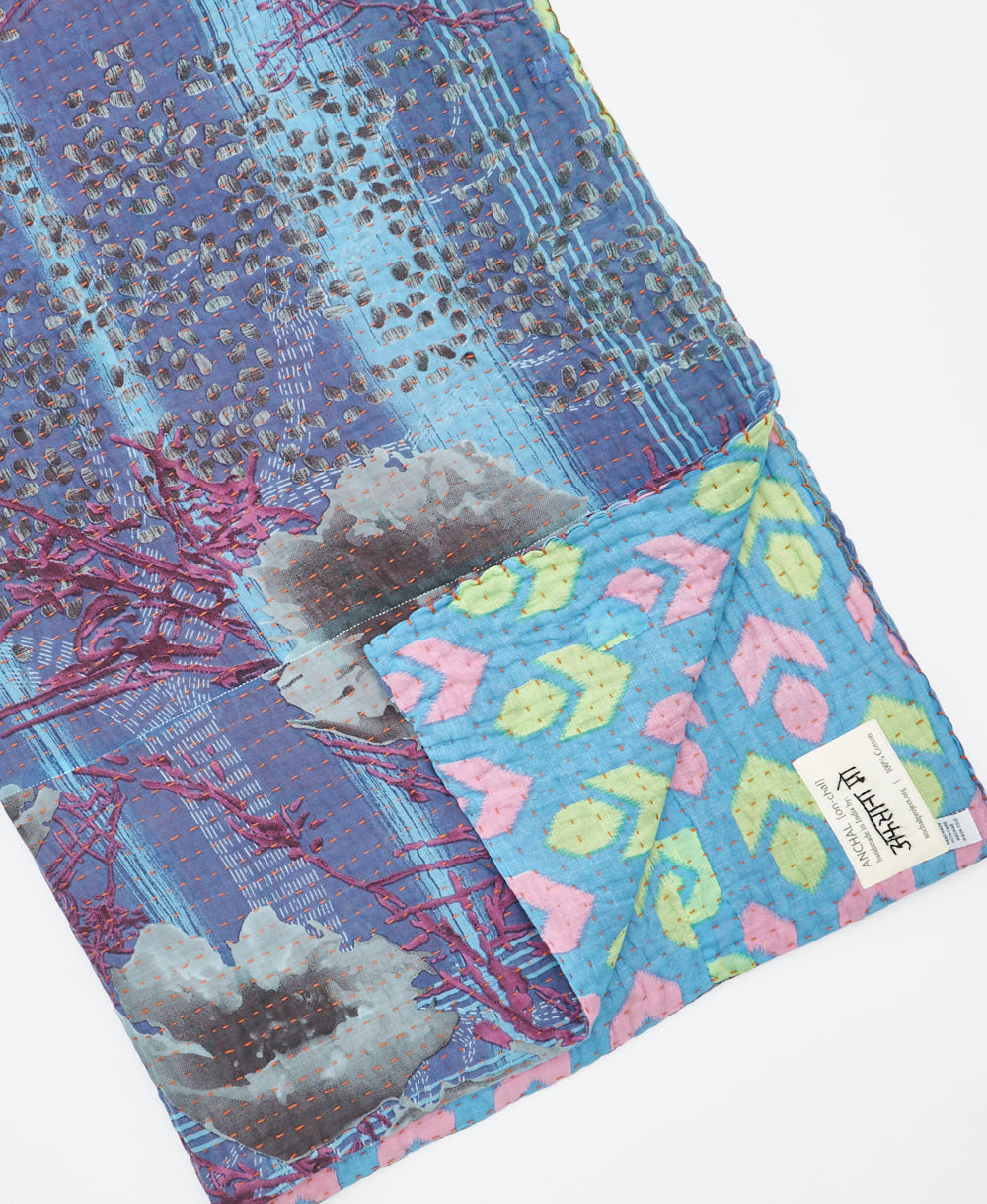 Kantha quilt throw featuring traditional kantha hand stitching