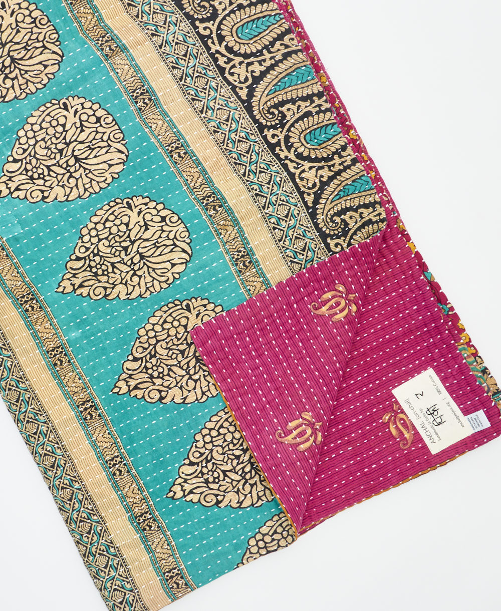 Kantha quilt throw featuring traditional kantha hand stitching