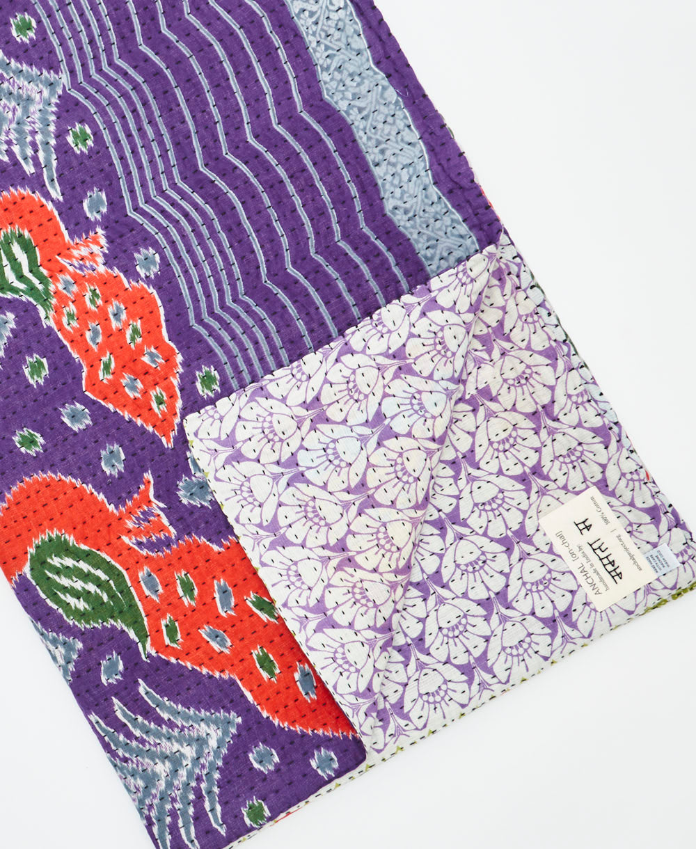 Kantha quilt throw featuring traditional kantha hand stitching