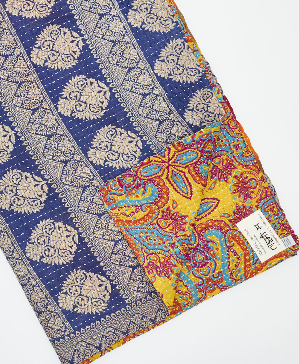 Kantha quilt throw featuring traditional kantha hand stitching