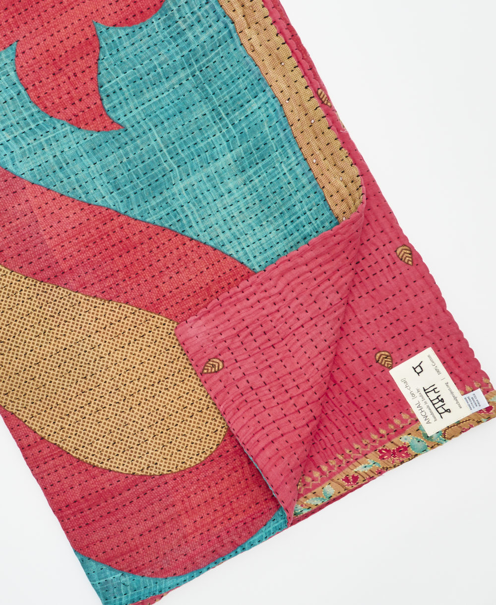 Kantha quilt throw featuring traditional kantha hand stitching
