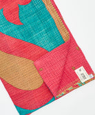 Kantha quilt throw featuring traditional kantha hand stitching