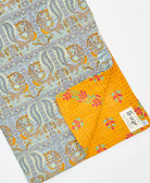 Kantha quilt throw featuring traditional kantha hand stitching