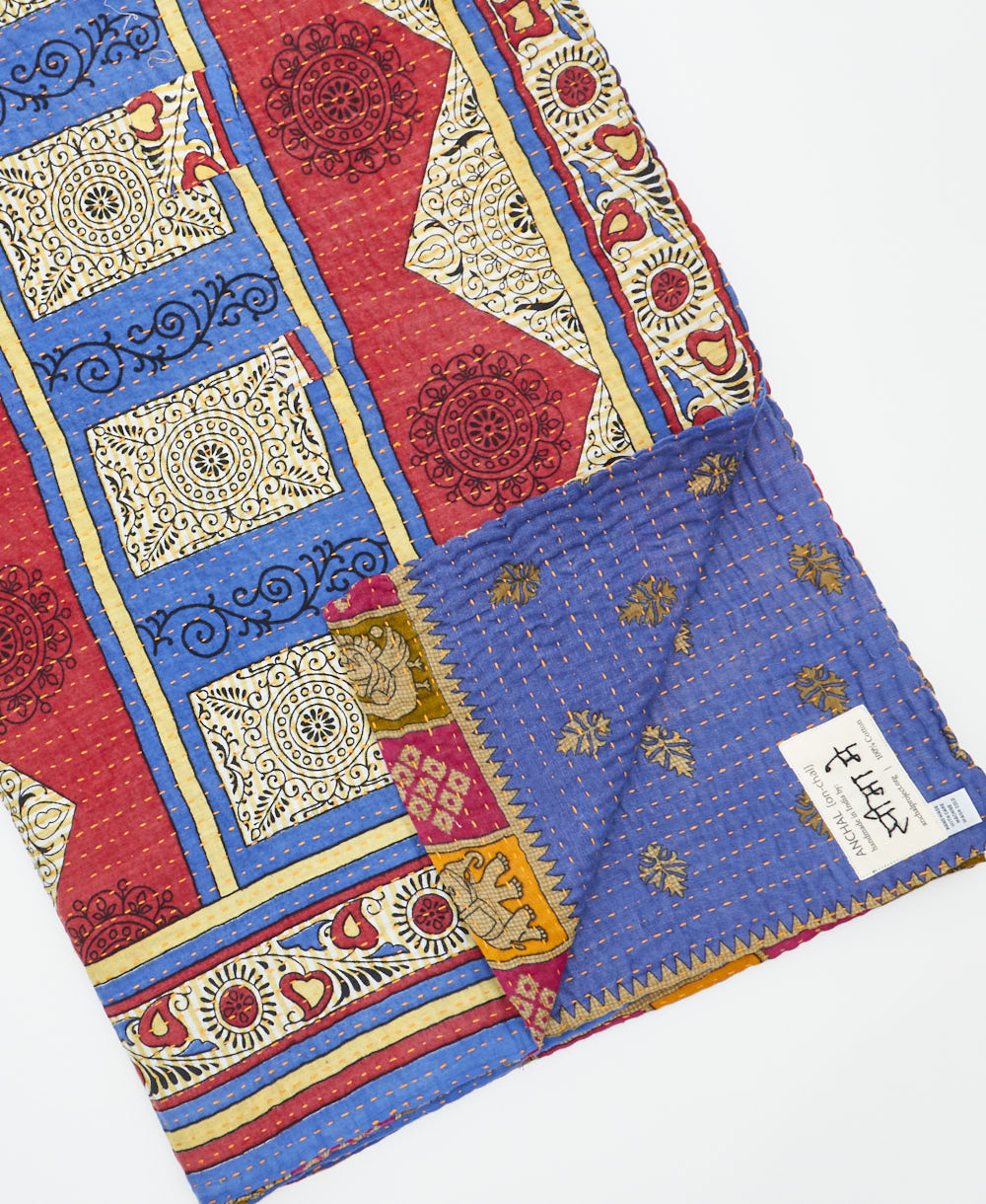 Kantha quilt throw featuring traditional kantha hand stitching