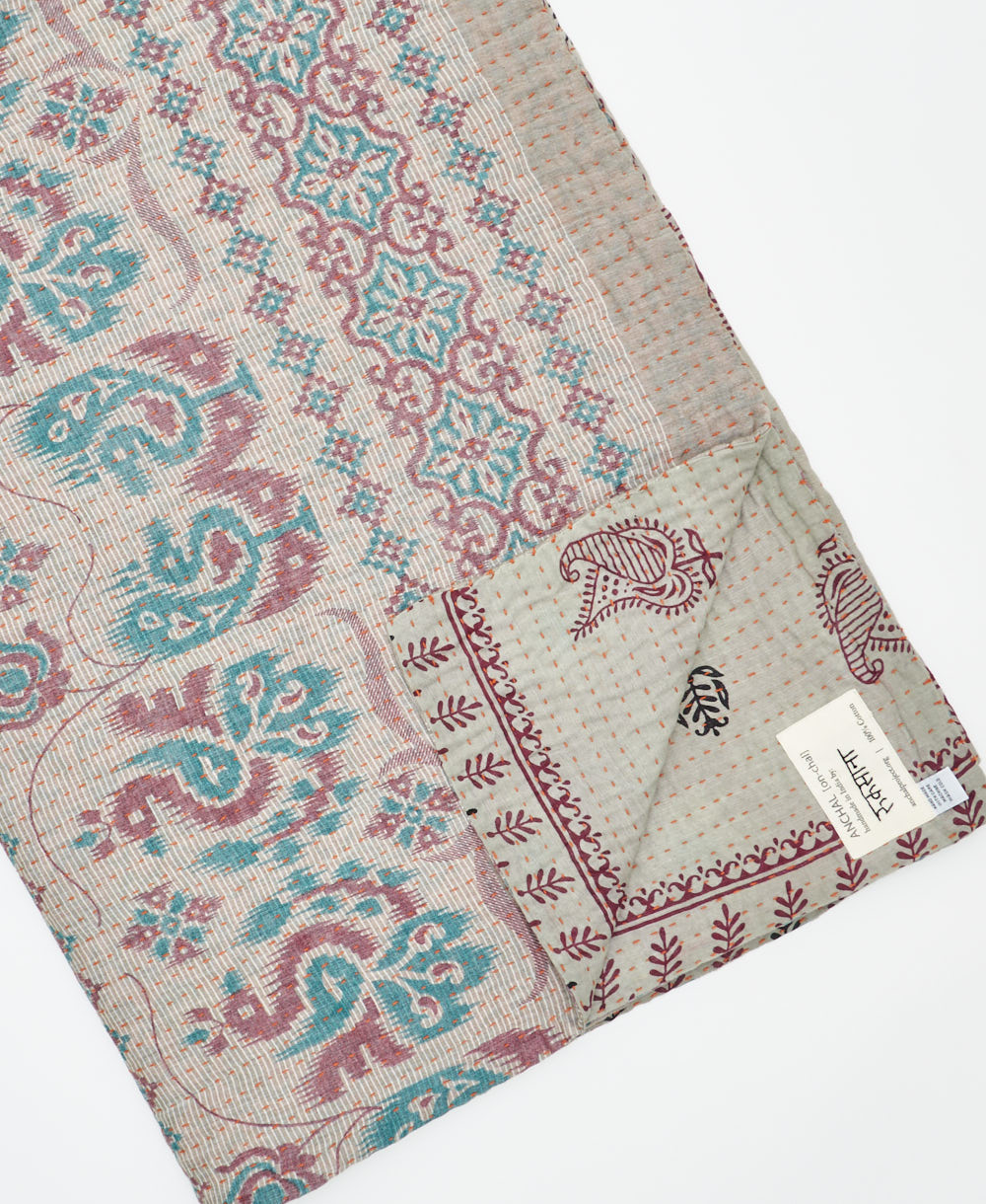 Kantha quilt throw featuring traditional kantha hand stitching
