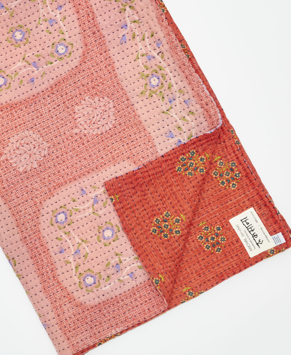 Kantha quilt throw featuring traditional kantha hand stitching
