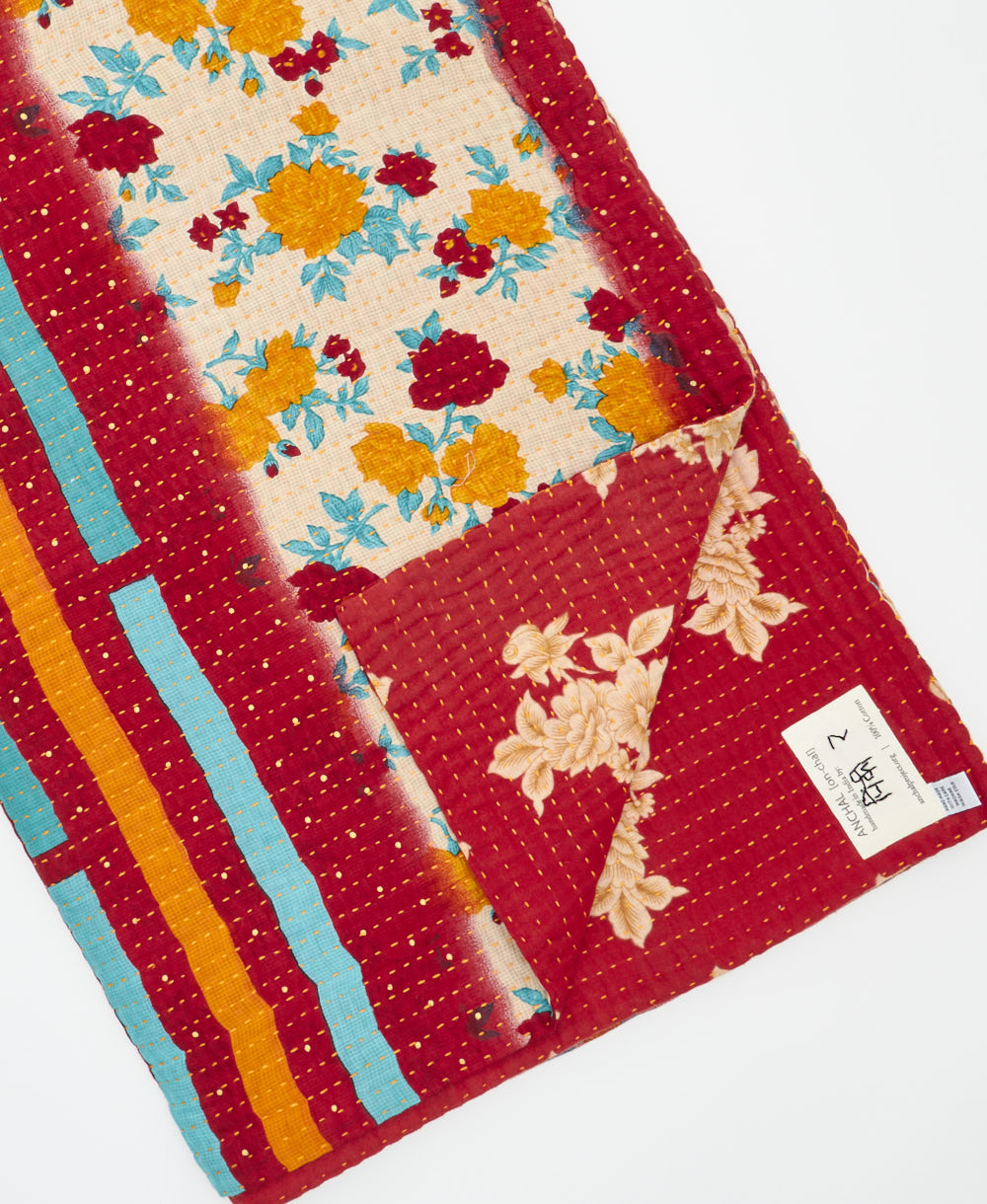 Kantha quilt throw featuring traditional kantha hand stitching
