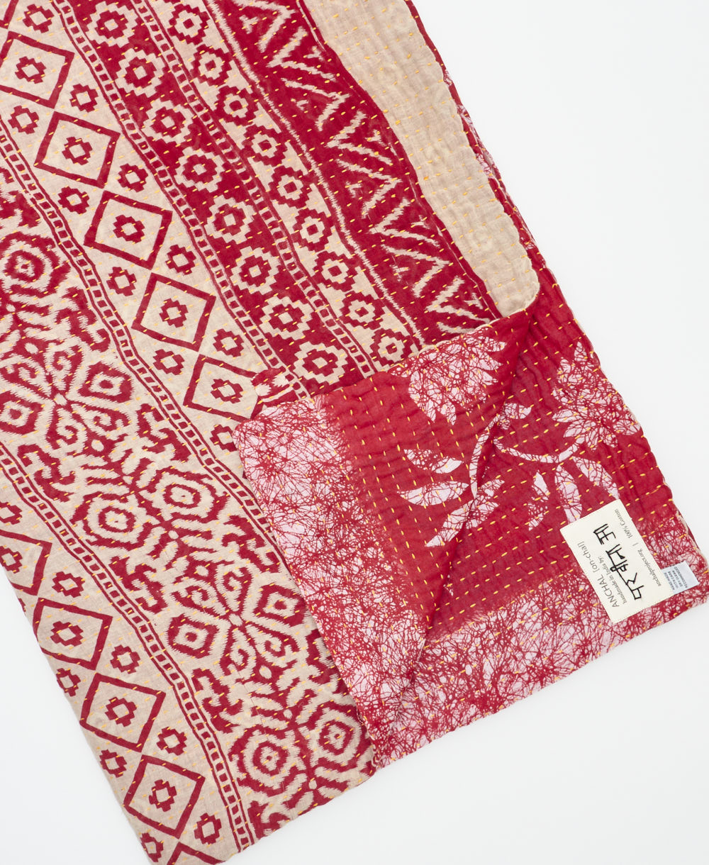 Kantha quilt throw featuring traditional kantha hand stitching