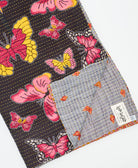 Kantha quilt throw featuring traditional kantha hand stitching