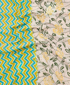 Kantha quilt throw featuring traditional kantha hand stitching