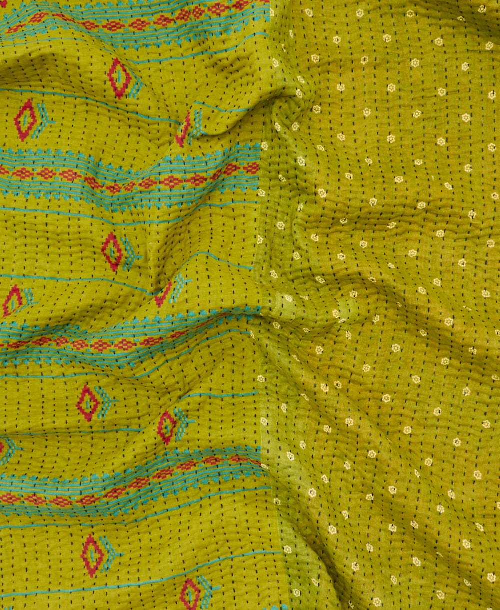 Kantha quilt throw featuring traditional kantha hand stitching