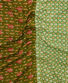 Kantha quilt throw featuring traditional kantha hand stitching
