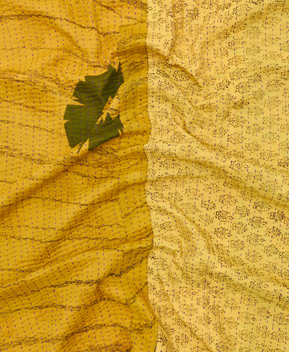 Kantha quilt throw featuring traditional kantha hand stitching