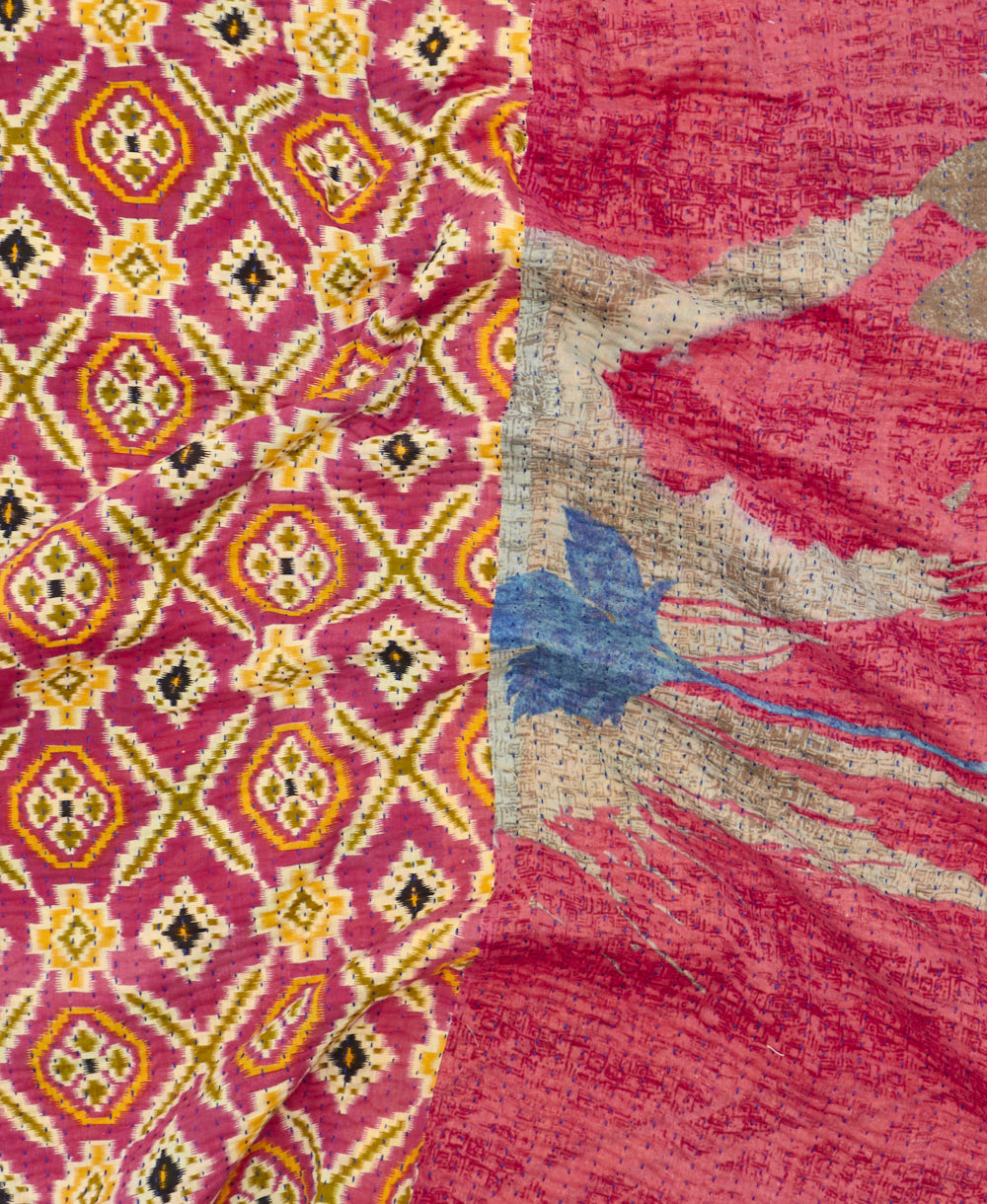 Kantha quilt throw featuring traditional kantha hand stitching