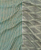 Kantha quilt throw featuring traditional kantha hand stitching