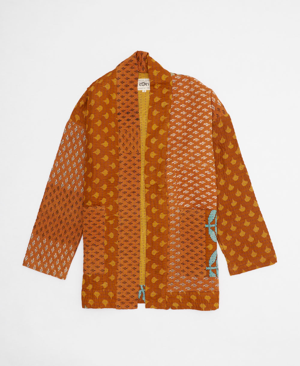 burnt orange floral open front quilted jacket made from upcycled saris by artisans in India