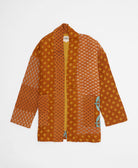 burnt orange floral open front quilted jacket made from upcycled saris by artisans in India