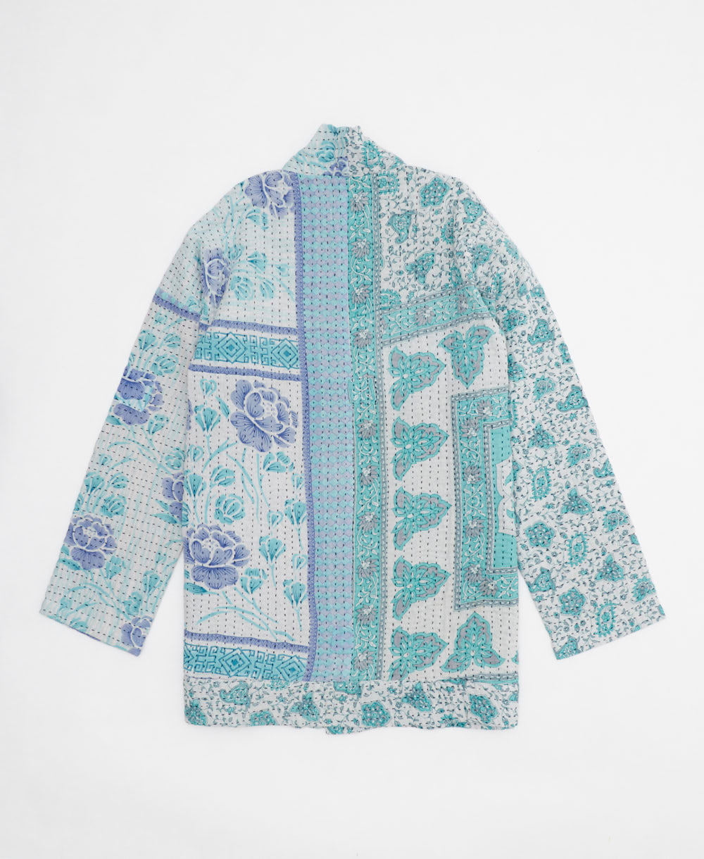 handmade open front cocoon quilted jacket in sky blue featuring a white & purple floral print