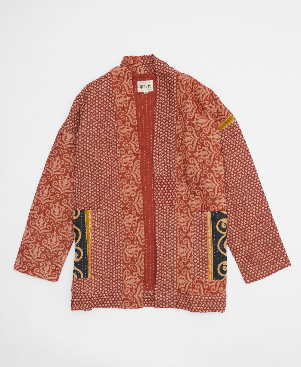 rust red geometric open front quilted jacket made from upcycled saris by artisans in India