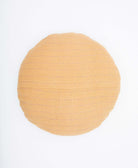 ethically made round pillow in tan made from upcycled cotton saris in India by women