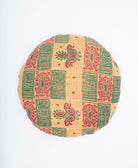 eco-friendly round pillow with tan, green and red square geo print