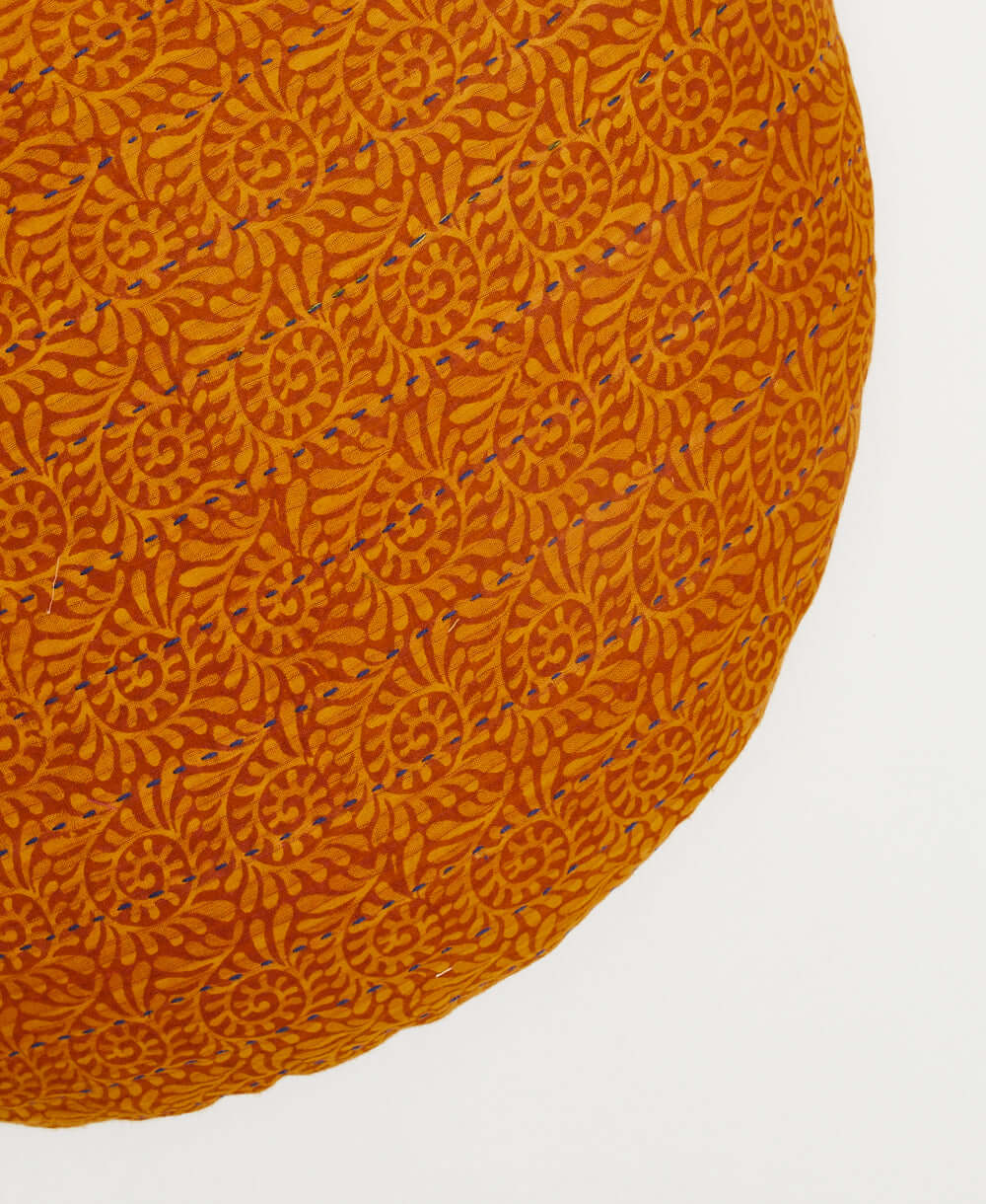 circle pillow in orange made from eco-friendly sustainable materials in India with removable down feather insert