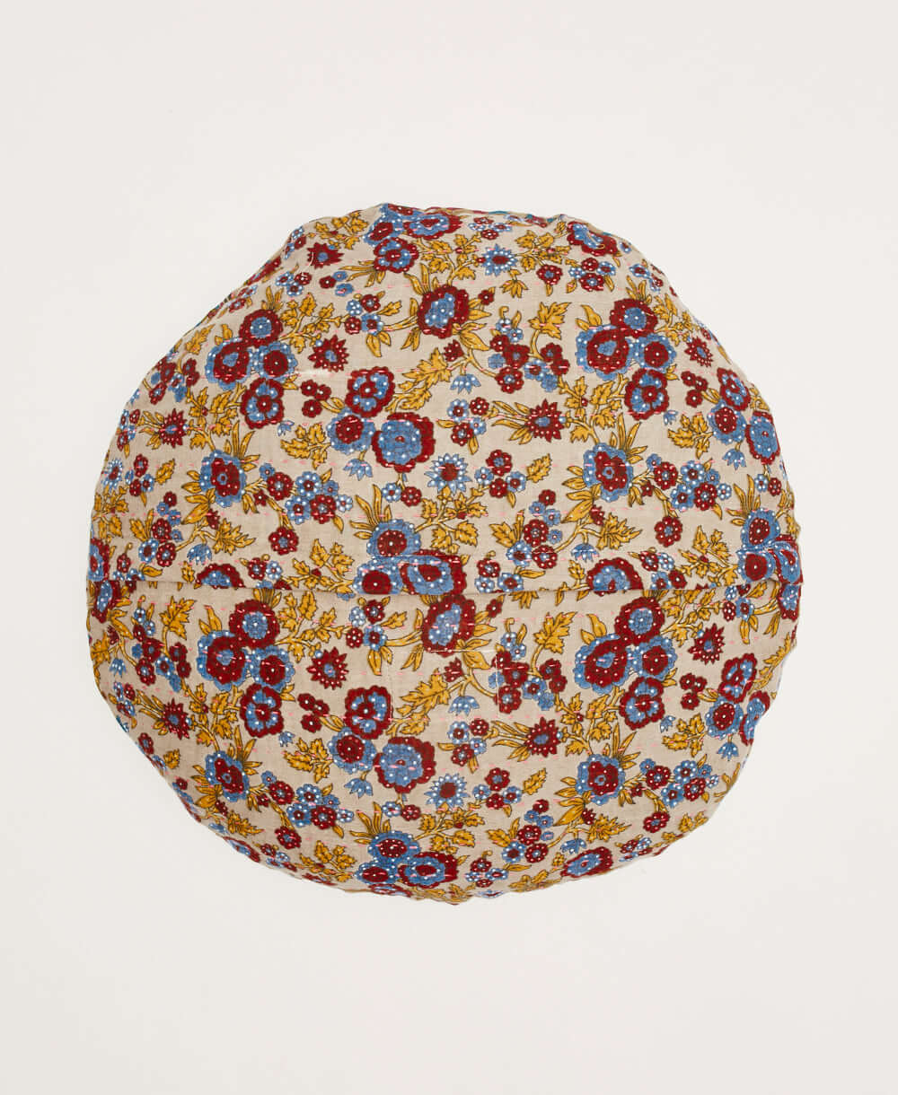 back of kantha round throw pillow in grey with dark red, gold and blue florals