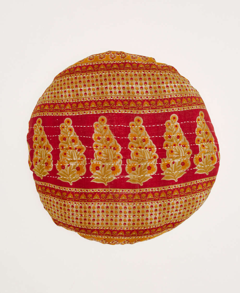 tan and red paisley round throw pillow handmade by women artisans in India