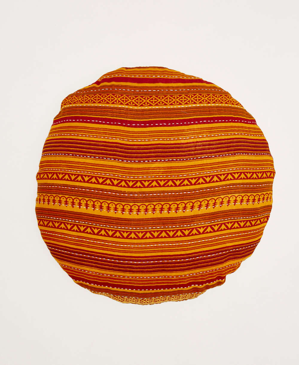 orange and red striped round pillow made from vintage cotton saris in India