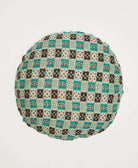 black, tan and teal floral checkered patterned round pillow made from upcycled vintage fabrics