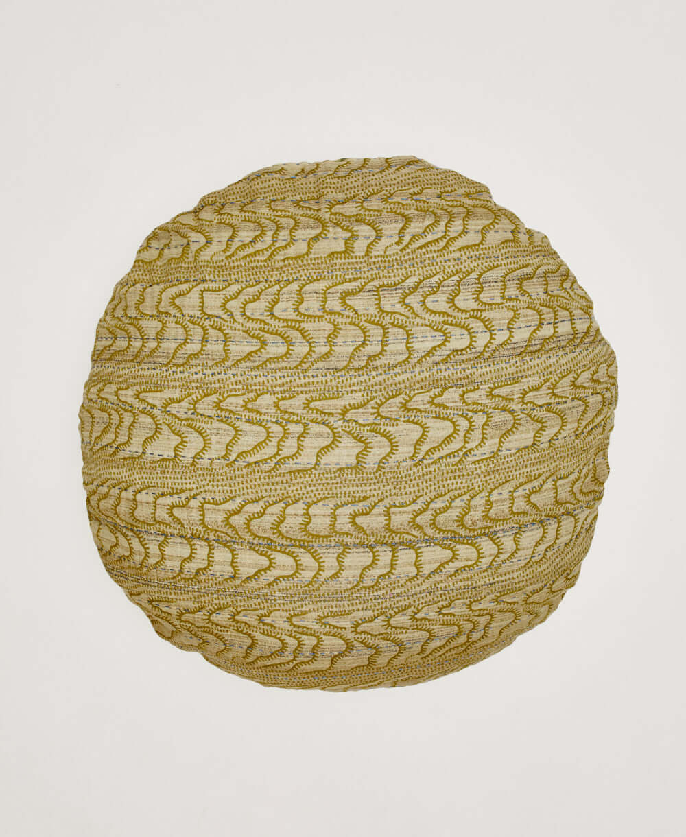 light green round pillow with olive green swirl pattern by Anchal