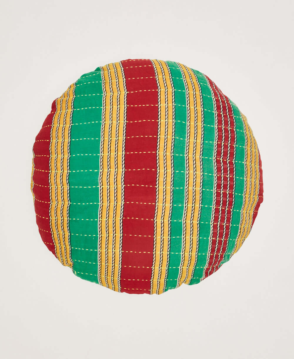 multi-colored round pillow made from upcycled cotton saris by artisans in India