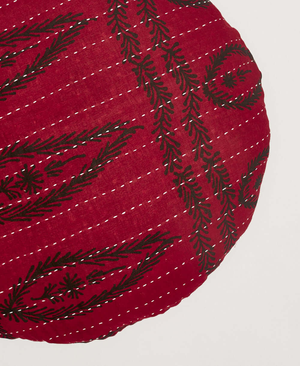 eco-friendly circle pillow made by women artisans in India showcasing hand-embroidery