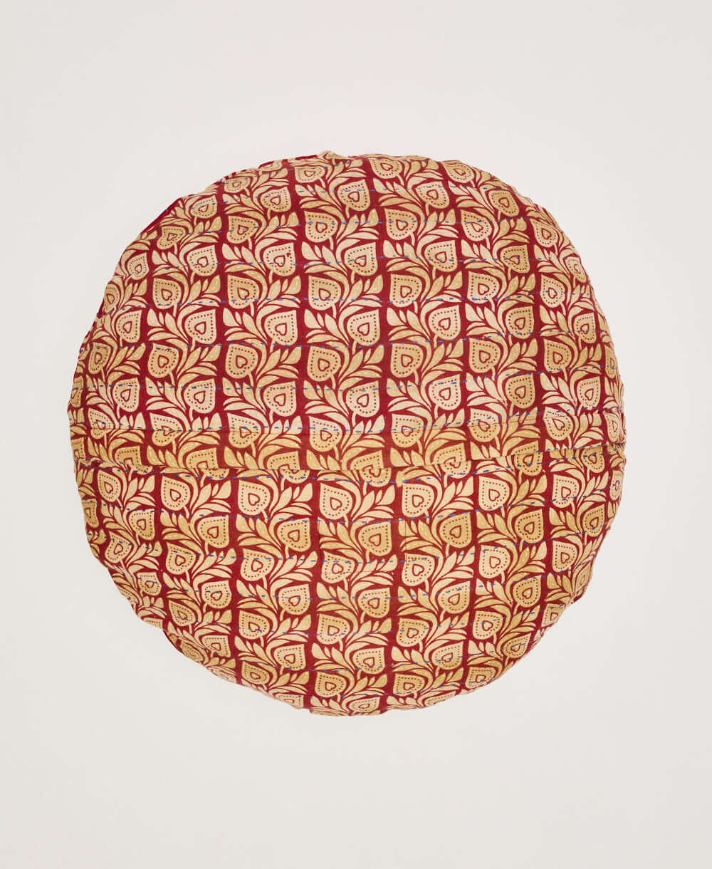 muted crimson red and tan pillow back of vintage round throw pillow