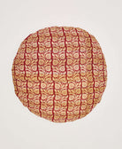 muted crimson red and tan pillow back of vintage round throw pillow