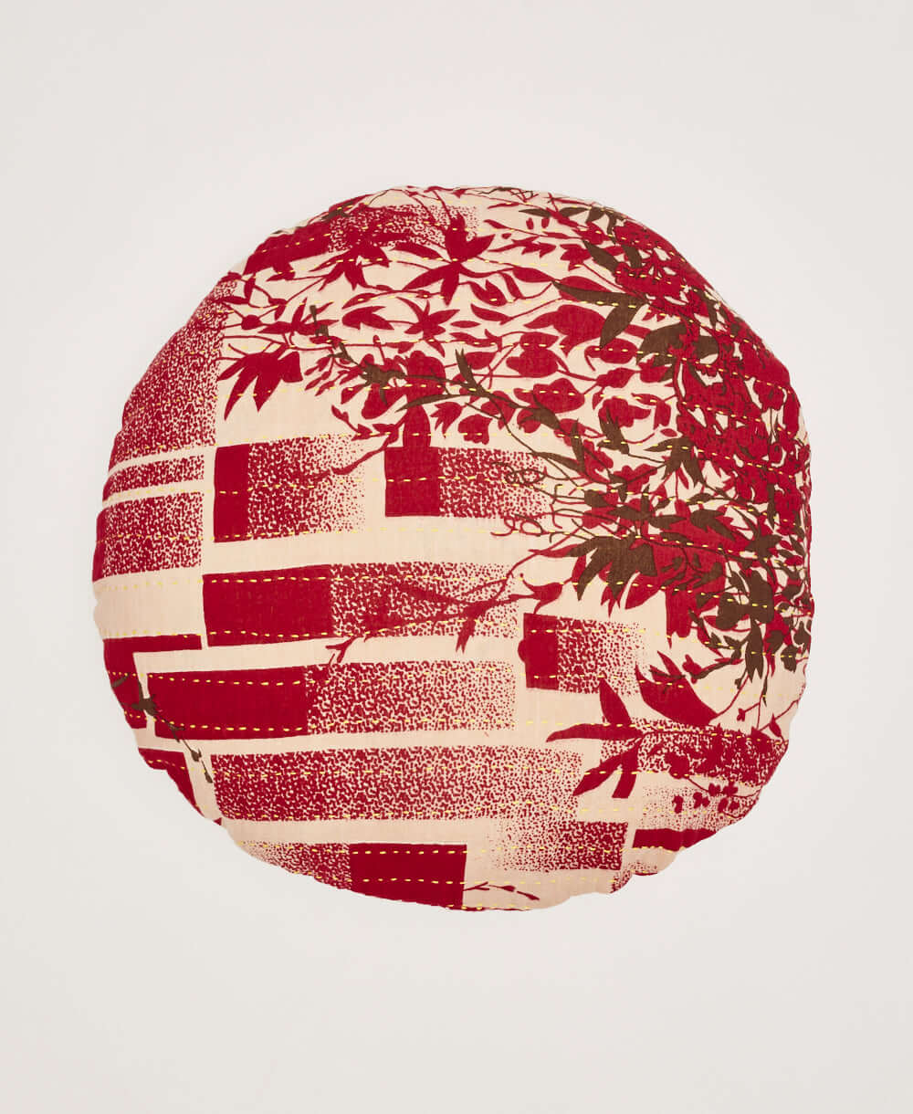 red round pillow with brown tree branch pattern made in India