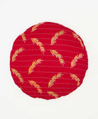 round pillow sustainably crafted using leaf print fabrics 