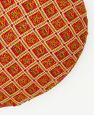 circle pillow in mustard and moss green featuring blue tradidiotnal kantha hand sittiching 