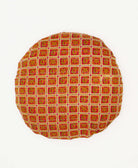 round pillow sustainably created using repurposed elephant print saris 