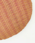 circle throw pillow featruing mustard yellow traditional kantha hand stitching 