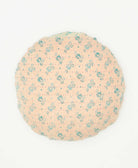 blush and turquoise floral round pillow made by artisans in india 