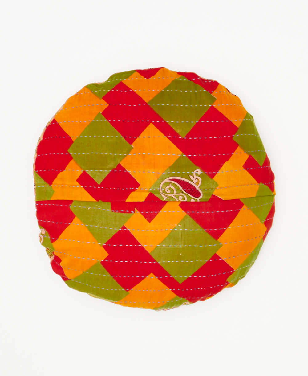 ethrically crafted round circle throw pillow made from repurposed fabrics 