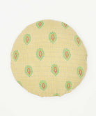 round throw pillow hand made by artisans in india featuring a stamp print 