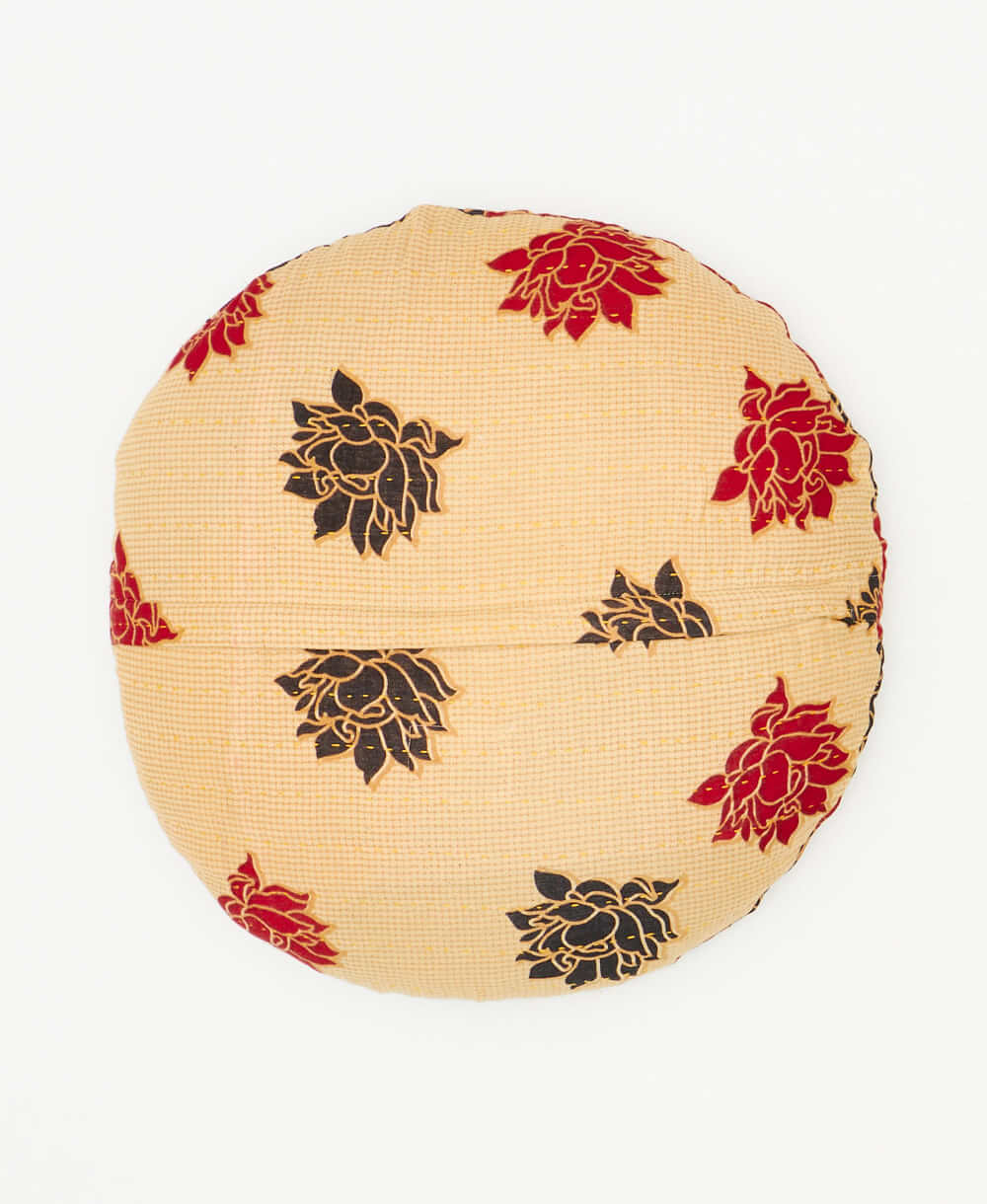 round throw pillow crafted using vintage floral cotton saris