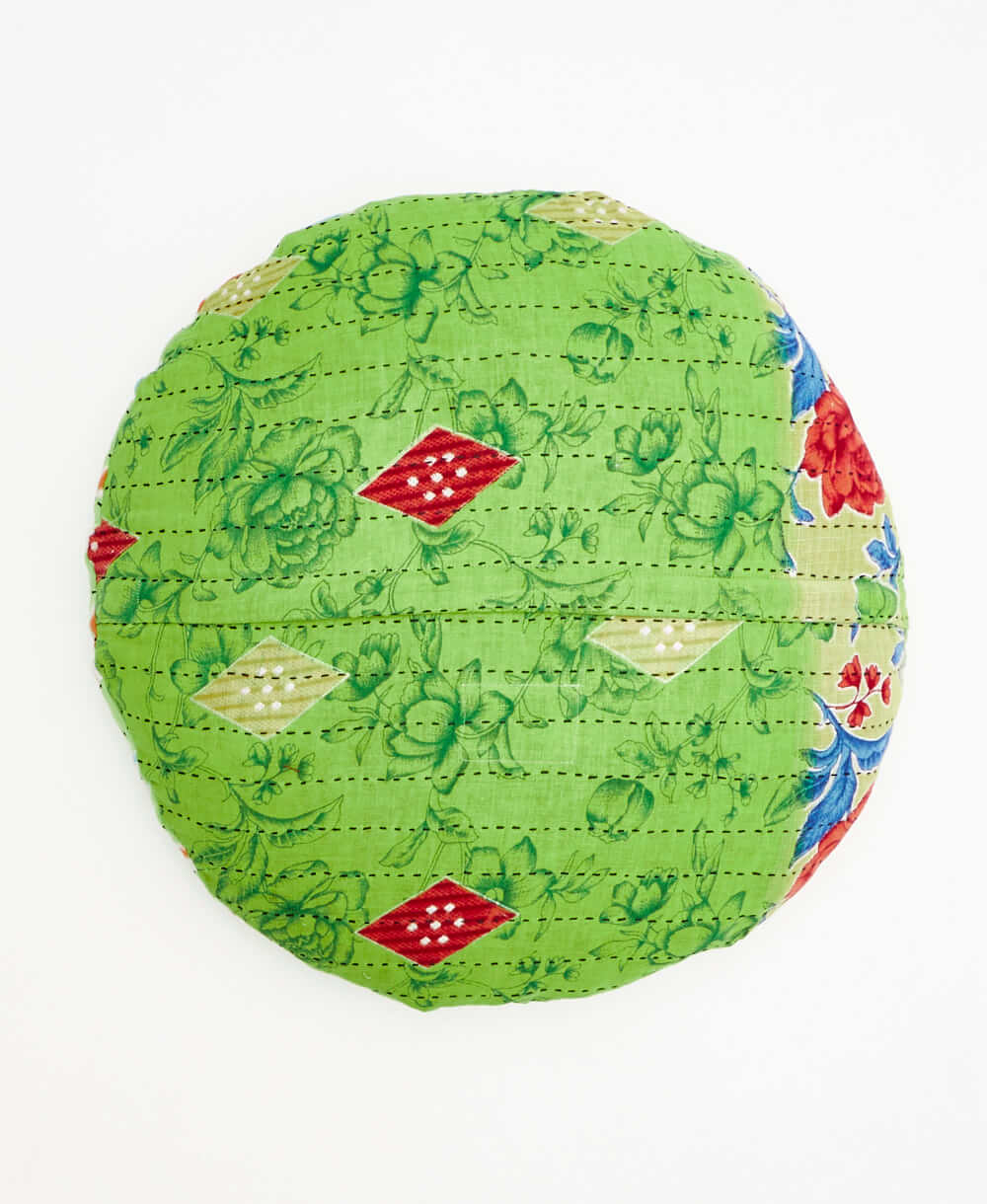 neon green round throw pillow made of vintage fabrics with handstitched details