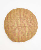 one-of-a-kind tan and blue round throw pillow with handstitched details 